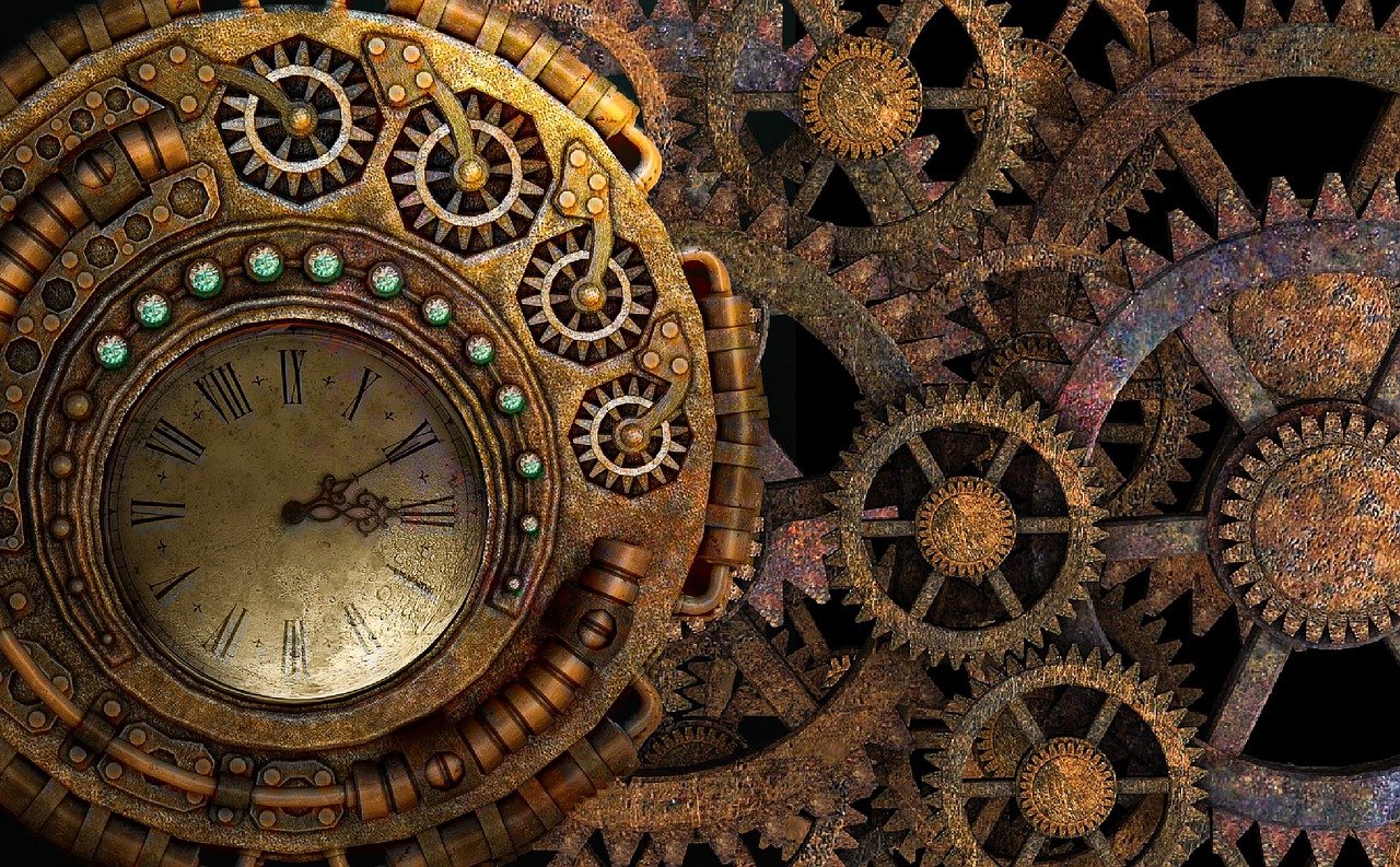 A clock in-between many cogwheels